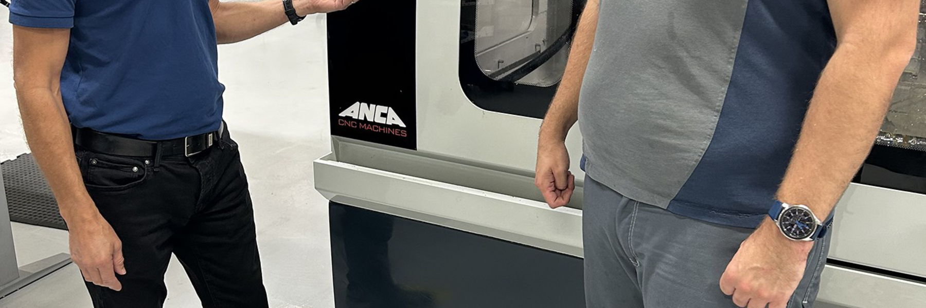 Stefan Frejd and Joel Törnqvist from Seco run tests in the geometry grinding machine at Seco Norrköping Production Unit for advanced drilling tools